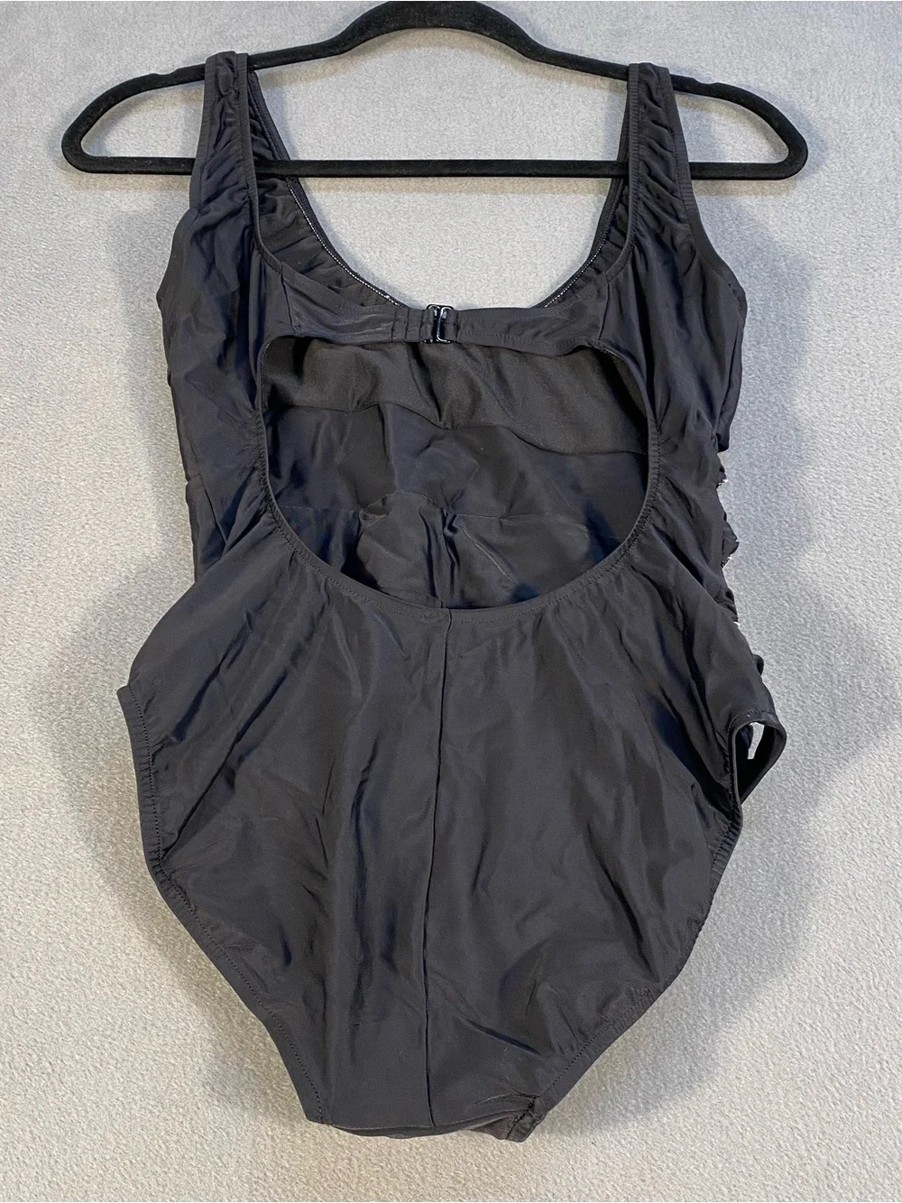 Venus black one piece swimsuit with side cuts silver embellishments, size 8